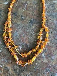 Beautiful pieces of amber with old style barrel screw clasp. I have owned for a bout 25 years. It seems to be missing a...