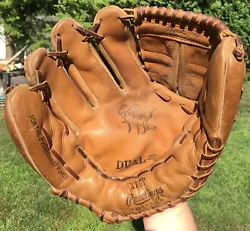 GLOVE FEATURES THE DUAL STEP DOWN PALM. HARD TO FIND GLOVE IN ANY CONDITION AND THIS ONE IS REAL NICE. GLOVE HAS INK AS...