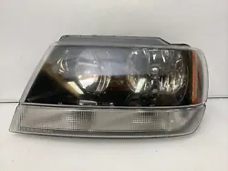 Up for sale is a good working part. It is a left side halogen headlight. This is a genuine authentic OEM JEEP part. All...