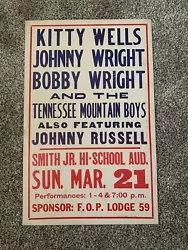 This vintage cardboard poster measures 14x22 inches and features a classic boxing-style design promoting a concert by...