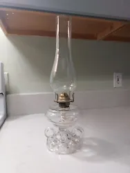 For sale, I have an antique oil lamp. No chips or cracks. It measures about 16