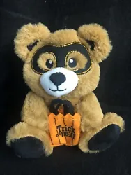 Masked teddy bear with trick or treat bag. Will be shipped in poly bag.