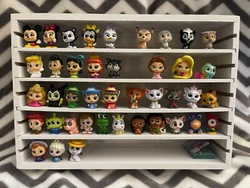 You pick Disney Doorables Series 5.
