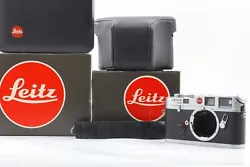 Leica M6 Body: 1707243. Genuine Leica Strap and Leather Case. Plastic Case with a small chip on the corner....
