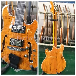 Top:Spalted Maple Top. Fretboard Material: Ebony. Neck Material: Mahogany. Body Material: Maple. The guitar photos are...
