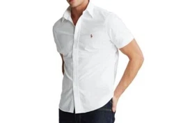 Cut for a lower armhole and a fuller sleeve. Short sleeves. Machine washable. Button-down point collar. Multicolored...