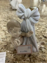 lladro “it’s a boy” figurine. Retired. No box. Approx 6 x 3Excellent condition