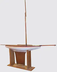 This massive pond boat possesses a huge copper keep with lead weighted end and a custom made cradle. The mast is 44