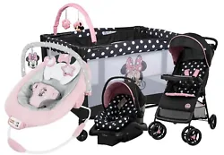Baby Playard. Stylish and cute inpink and black, this mini nursery is both a cozy bassinet and full-size playyard that...