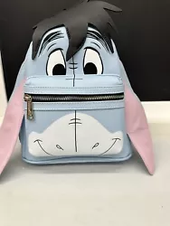 Carry your essentials in style with this Disney Loungefly Eeyore Figural Cosplay Mini Backpack. The backpack features a...