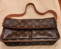 This bag was lightly used. (Front and Back).