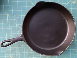 Griswold large block logo EPU cast iron skillet no. 8, pattern no. 704 B. Marked as shown in the photos and video. The...