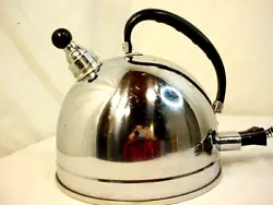 Heats up quickly and works well. Whistles loudly and the cap attaches securely. Has very light wear from age and use....