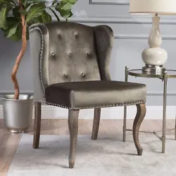 This wingback chair is a great addition for any room. The buttons on the backrest give it a classic design, while the...