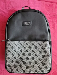 This stylish GUESS backpack for women is the perfect accessory to complete any outfit. With its sleek design and...