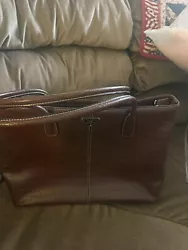 This is a beautiful PRADA Vitello Daino Shoulder Bag that will make any woman feel stylish and chic. The bag features a...