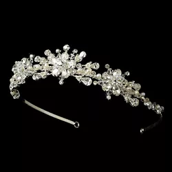 Modern and sparkling, this piece features a unique floral or snowflake pattern of Swarovski crystals, freshwater...