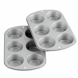 This Non Stick Standard Muffin Baking Pan has a durable construction that provides even-heating and the non-stick...
