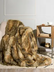 Luxuriously lined with a color coordinated faux rabbit fur. Thick, lush and rich our faux fur throw is a stunning...