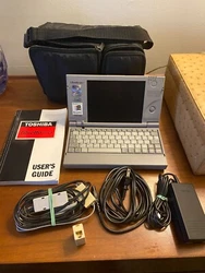 The case logic case seems a perfect fit for it, very tidy. Im not sure if its Win 95 or 98, but the front bezel has Win...