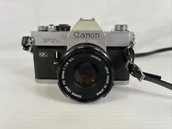 This Chrome Canon FTb-QL 35mm SLR Camera with 50mm f/1.8 FL Lens is perfect for photography enthusiasts. It is a great...
