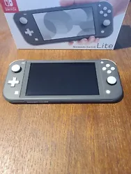 Nintendo Switch Lite - gris. Presque comme neuve