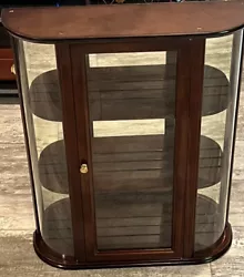 Vintage Bombay Company Curved Glass Wall Curio Shelf Cabinet with Mirror. Condition is Used. Shipped with USPS Ground...