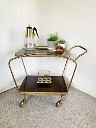Perfect addition to complete your Mid Century Modern look! Can be used as a beautiful dry bar, record player stand, or...