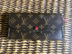 Portefeuille Louis Vuitton modèle Emilie - Réf CA1170. Louis Vuitton Emilie model wallet - Ref CA1170. Small marks on...