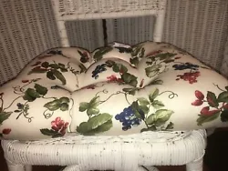 Orchard Trail or Berry design. One quilted chair cushion. White with muted red and blue berry and leaves design. There...