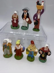 Je vends ces sept santons du santonnier GUEGAN ( signés sous le socle)Possibilité de vendre à l’unité Vendu comme...