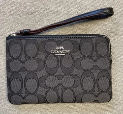 COACH Wristlet Black Canvas. Excellent condition looks new