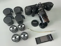 For sale is a vintage Olympus OM-2 camera bundle that includes a 250 film back, OM Winder 2, Vivitar Series 1 Macro...