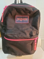 JanSport Backpack Black and Hot Pink Zippers and Lining. Lightweight, but strong backpack. Accent color is hot pink,...