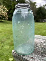 This antique Mason jar with Ball lid measures approx 9.0