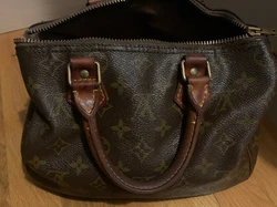 louis vuittons speedy. Vintage Zipper doesn’t work and has a metallic odor 6”x7”x10”