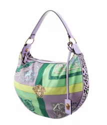 Gently used Versace nylon shoulder bag. Zipper close on top. Can fit a large wallet, iPhone, keys and lipgloss no...