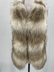 Fun Skies Are Blue faux fur vest in white, tan & black. Open front. Length = 21