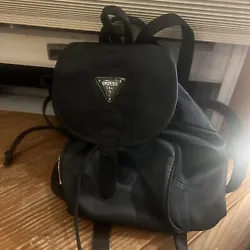 guess mini backpack excellent Condition. There are some initials on the back and white, but they can easily be covered...