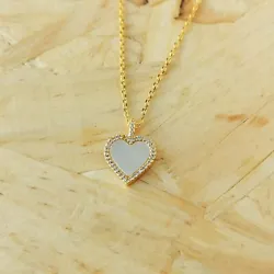 Kate Spade Take Heart. The heart wants what it wants: a pretty pendant with mother-of-pearl and crystal accents....