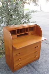 This great Secretary Desk is made of wood, teak wood, and veneer. This secretary desk is an excellent example of Danish...