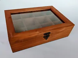 Tea bag organizer box.  Stained bamboo .   10.5 inches wide 7.5 inches deep and  3 inches tall. 