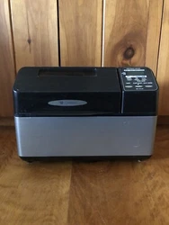 This listing is for a Zojirushi BB-CEC20 Home Bakery Supreme Automatic 2 Lb. Bread Machine Maker.  The machine is a in...