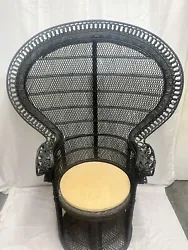 Large black wicker peacock chair in good condition. Small unravel on the back of the chair along with a few very small...