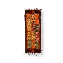Very unusual piece. The base is a striped woven fabric with decorative edges and fringe. Stylized flowers look to be...
