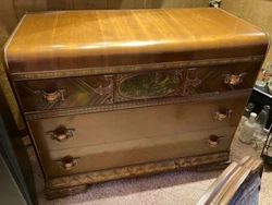 vintage dresser with bakelite handles.