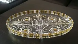 Very elegant Crystal Oval Plate divided in 4 sections, has very beautiful design and some yellow color on the side,...