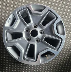 THE PICTURES ARE OF THE EXACT RIM FOR SALE.
