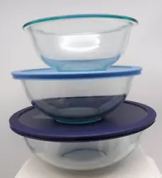 5 PIECES Pyrex Clear Glass Nesting Bowls. 326 - 4 QT has Dark Blue Lid. 323 - 1.5 QT NO LID. 325 - 2.5 QT has Light...
