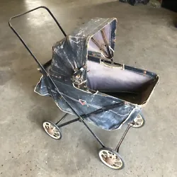 Antique Metal Folding Style Fabric Baby Doll Stroller. Please see photo for condition/ tears in the fabric. Rolls fine...
